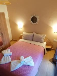 Postel nebo postele na pokoji v ubytování Kali Luxury Apartments -Garden-Gold-