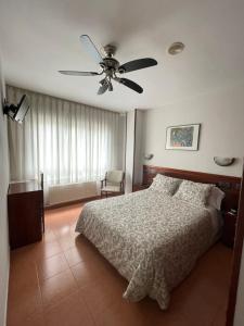 Postel nebo postele na pokoji v ubytování Hotel Valdés