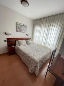 Postel nebo postele na pokoji v ubytování Hotel Valdés