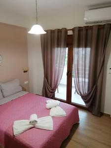 Postel nebo postele na pokoji v ubytování Kali Luxury Apartments -Garden-Gold-