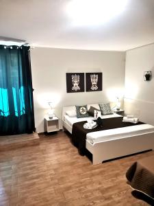 Postel nebo postele na pokoji v ubytování A due passi dal centro Sweet Rooms