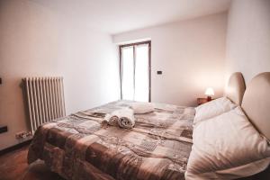 Postel nebo postele na pokoji v ubytování Residence Aquila - Bilo Zerbion