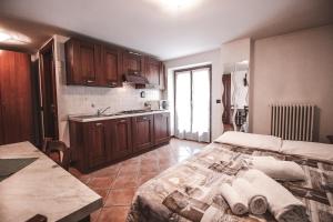 Postel nebo postele na pokoji v ubytování Residence Aquila - Mono Punta Valnera