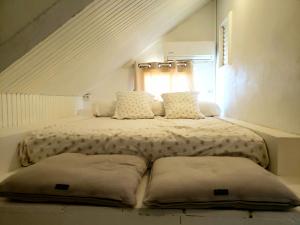 Una cama o camas en una habitación de RESIDENCE COCO