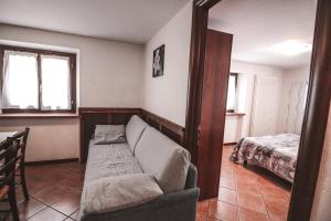 Postel nebo postele na pokoji v ubytování Residence Aquila - Bilo Punta Valfredda