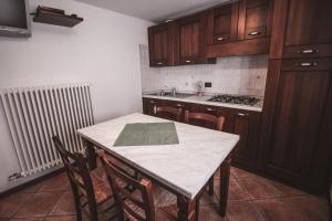 Kuchyň nebo kuchyňský kout v ubytování Residence Aquila - Bilo Punta Valfredda