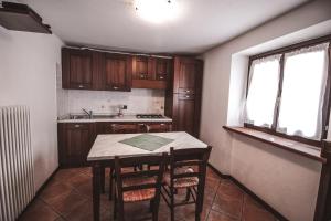Kuchyň nebo kuchyňský kout v ubytování Residence Aquila - Bilo Punta Valfredda