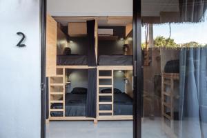 Palanda nebo palandy na pokoji v ubytování Maui Hostels Playa del Carmen