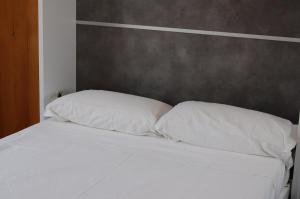 Säng eller sängar i ett rum på Ático la Azotea con terraza PRIVADA
