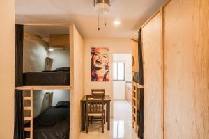 Postel nebo postele na pokoji v ubytování Maui Hostels Playa del Carmen