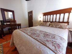 Voodi või voodid majutusasutuse Meson del Alferez Coatepec toas