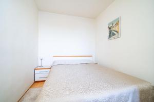 Postel nebo postele na pokoji v ubytování Apartment Bakus
