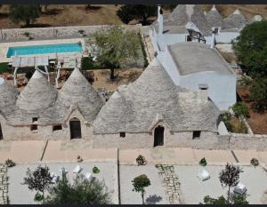 an overhead view of a house with a roof at i Trulli del Fauno in Alberobello