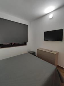 TV a/nebo společenská místnost v ubytování Casa Diaz