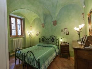 Кровать или кровати в номере Apartment Residenza Gabrielli