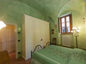 Кровать или кровати в номере Apartment Residenza Gabrielli