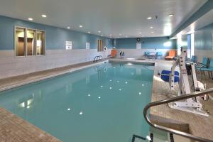 a large swimming pool in a hotel room at Holiday Inn Express Socorro, an IHG Hotel in Socorro