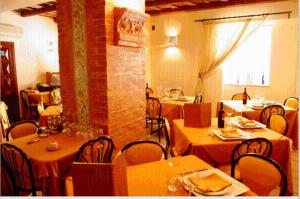 A restaurant or other place to eat at Locanda Re Ruggero