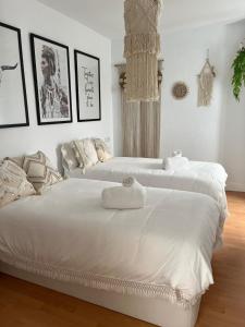 Postel nebo postele na pokoji v ubytování Enjoy Ávila 2 - LA CATEDRAL