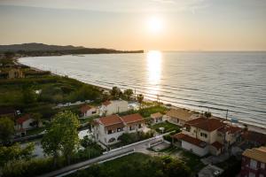 an aerial view of a town next to the water at Tamaris Beach House in Acharavi