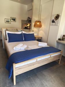 Ένα ή περισσότερα κρεβάτια σε δωμάτιο στο Xenios Zeus Apartments