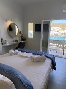 Ένα ή περισσότερα κρεβάτια σε δωμάτιο στο Xenios Zeus Apartments