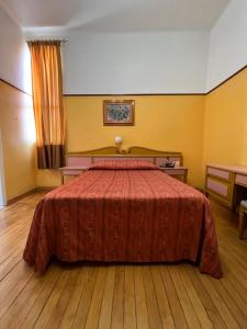 Postel nebo postele na pokoji v ubytování Hotel Isabel