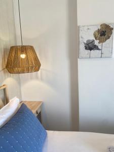 Ένα ή περισσότερα κρεβάτια σε δωμάτιο στο Xenios Zeus Apartments