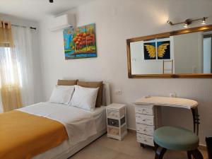 Ένα ή περισσότερα κρεβάτια σε δωμάτιο στο Villa Johell