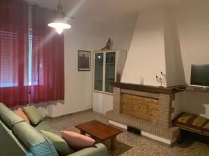 TV a/nebo společenská místnost v ubytování Casa Delle Mura