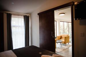 מיטה או מיטות בחדר ב-Hotel RM Avandaro