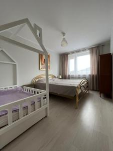 Postel nebo postele na pokoji v ubytování agro NOCLEGI