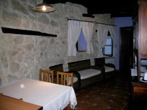 Un restaurante o sitio para comer en Apartmento El botón charro