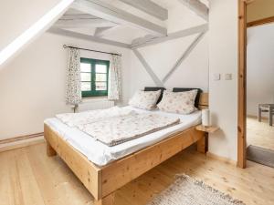 a bedroom with a large bed in a room at Spacious Holiday Home in Landstorf Zierow with Beach Near in Zierow