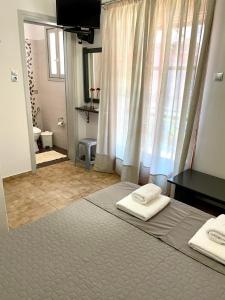 Posteľ alebo postele v izbe v ubytovaní Anesi Rooms To Rent