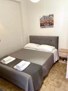 
Ein Bett oder Betten in einem Zimmer der Unterkunft Anesi Rooms To Rent
