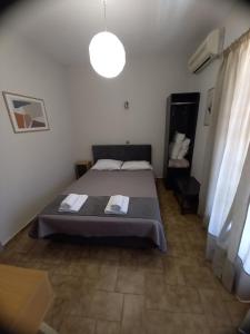 Posteľ alebo postele v izbe v ubytovaní Anesi Rooms To Rent