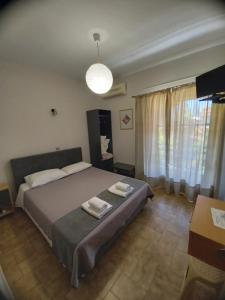 Posteľ alebo postele v izbe v ubytovaní Anesi Rooms To Rent