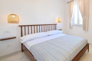 Postel nebo postele na pokoji v ubytování La Dimora Dei Nonni