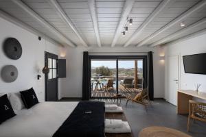 Posteľ alebo postele v izbe v ubytovaní Ikies of Mykonos + 37 fotografií