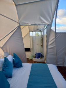 Postel nebo postele na pokoji v ubytování Origen Glamping en Villa de Leyva