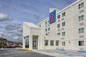 a building with a sign on the side of it at Motel 6-York, PA - North in York