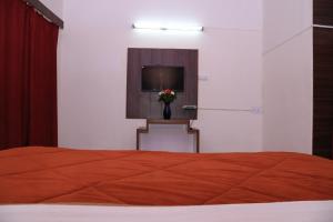 Ένα ή περισσότερα κρεβάτια σε δωμάτιο στο Prince Hotel Mallroad