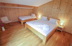 Voodi või voodid majutusasutuse Amazing Apartment In Dalaas With 2 Bedrooms And Wifi toas