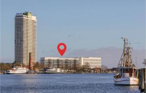 a boat in the water with a red marker at Highend Travemünde - Whg 106 in Travemünde