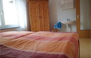 Ein Bett oder Betten in einem Zimmer der Unterkunft Gorgeous Apartment In Mühlhausen