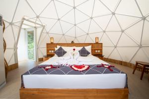 Postel nebo postele na pokoji v ubytování Triyana Resort and Glamping