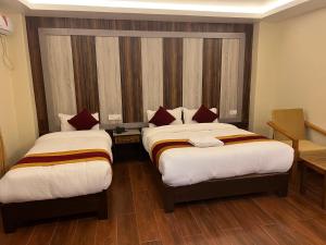 Katil atau katil-katil dalam bilik di Hotel Murano