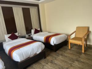 Katil atau katil-katil dalam bilik di Hotel Murano