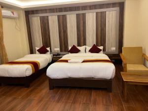 Katil atau katil-katil dalam bilik di Hotel Murano